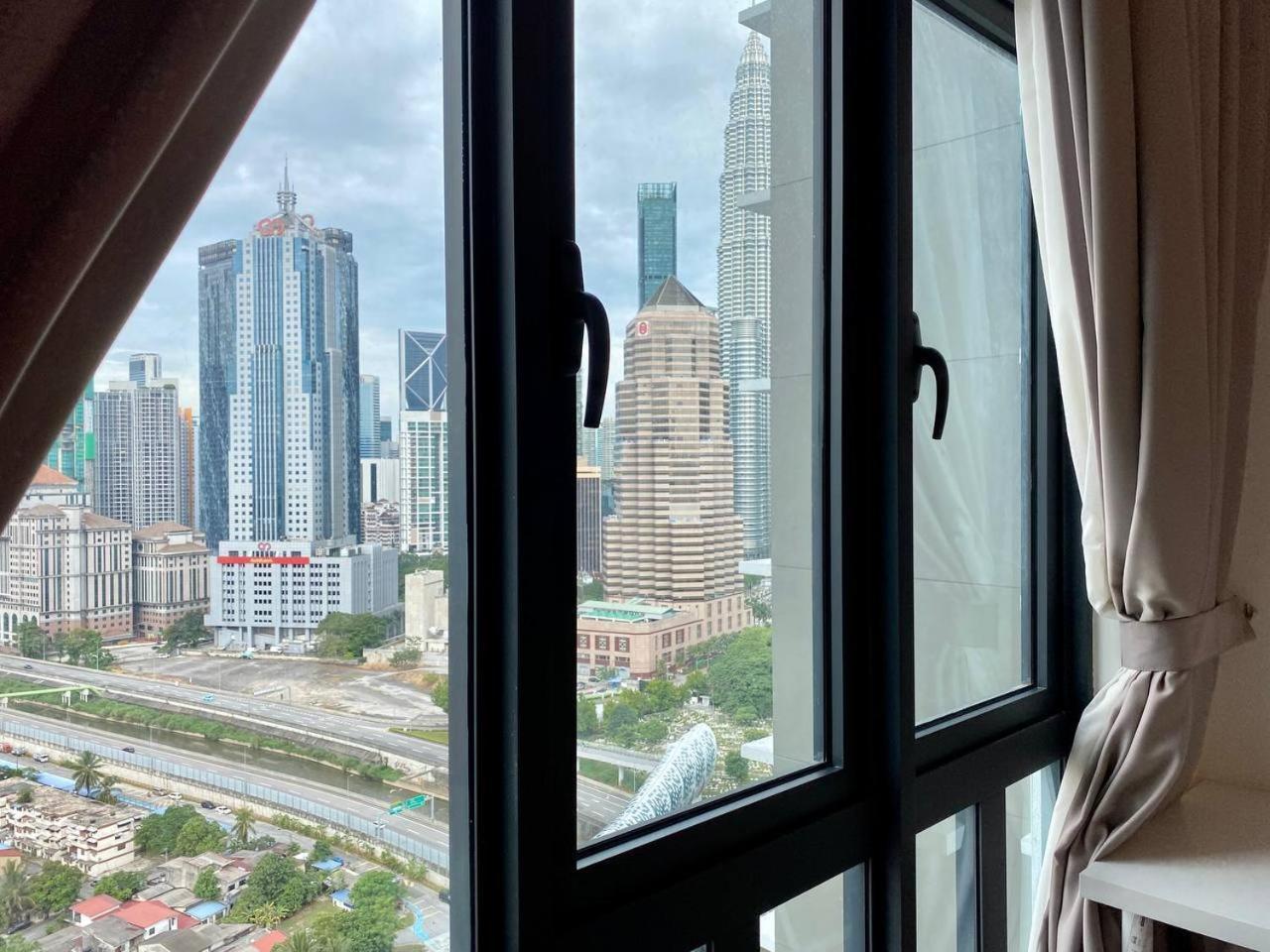Legasi Kampung Baru Kl Homestay Куала-Лумпур Номер фото